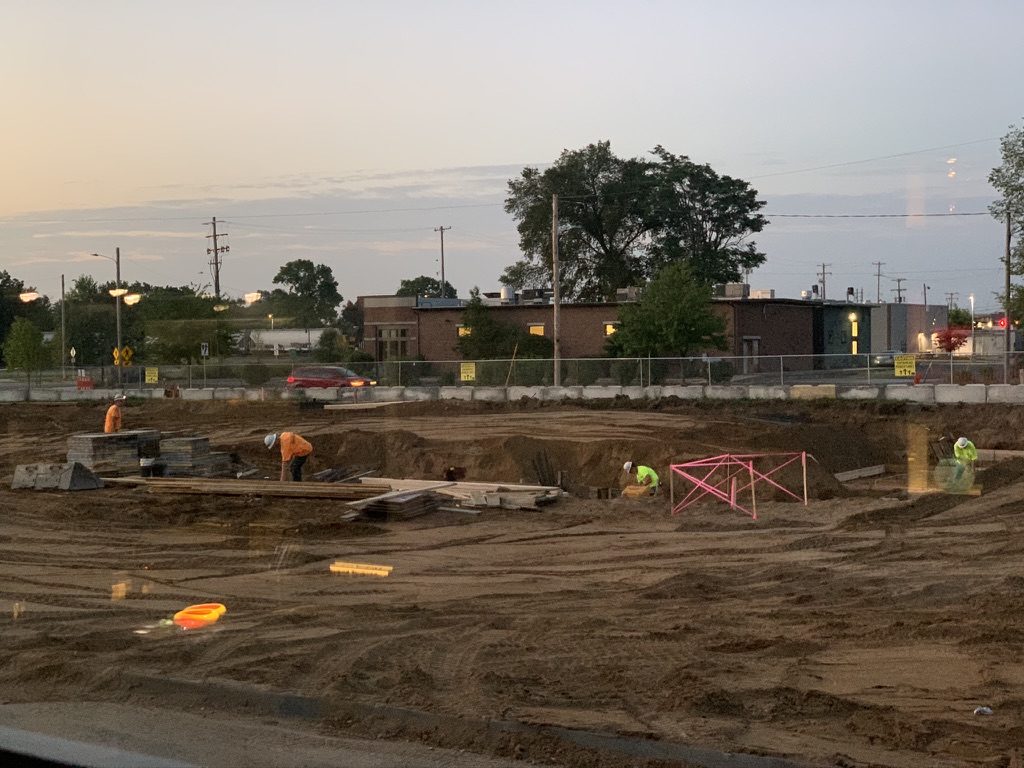Harrison Circle, foundation work at dusk